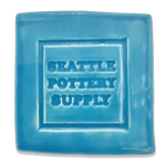 A glaze tile in Seattle Pottery Supply glaze SP77 Turquoise, stamped with Seattle Pottery Supply