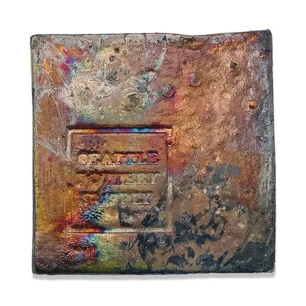raku glaze tile in copper and iridescence  